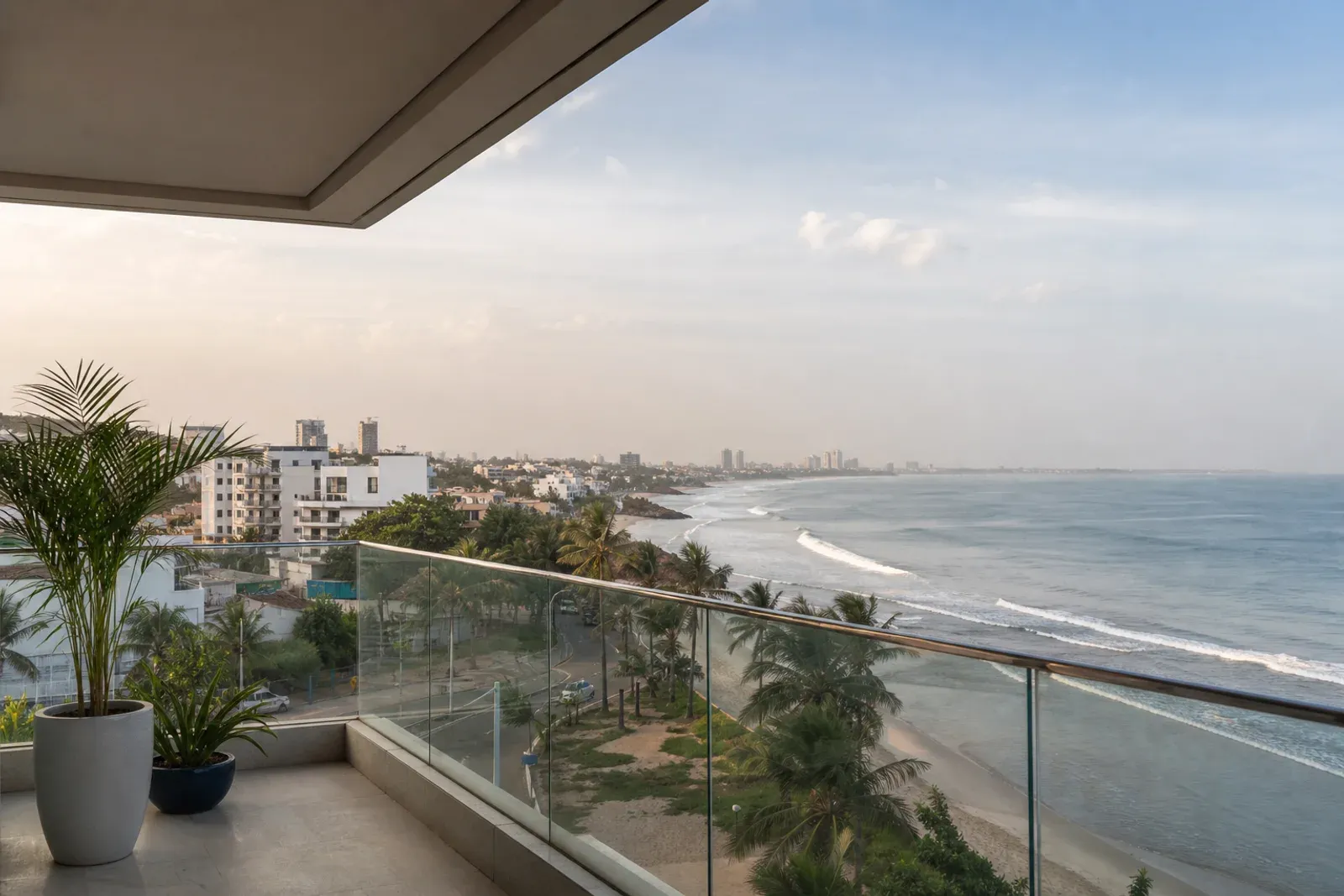 Morning view of the Labadi coastline from a contemporary apartment balcony in Accra